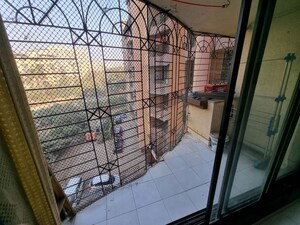 Balcony in 2 BHK Apartment at Yashraj Park CHS, Kasarvadavali – for Rent