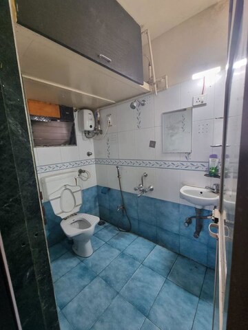 Bathroom in 2 BHK Apartment at Yashraj Park CHS, Kasarvadavali – for Rent