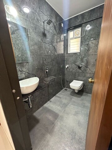 Bathroom in 3 BHK Apartment at Shreepad Guruvaibhav CHS, Kothrud – for Sale