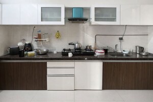 Kitchen in 2 BHK Apartment at Duville Riverdale Heights, Kharadi – for Rent