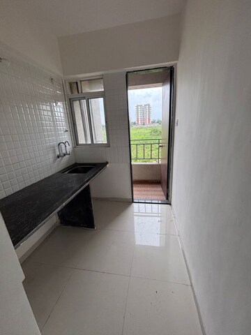 Building Lobby in 1 BHK Apartment at Ajinkya Towers, Charholi Budruk – for Rent