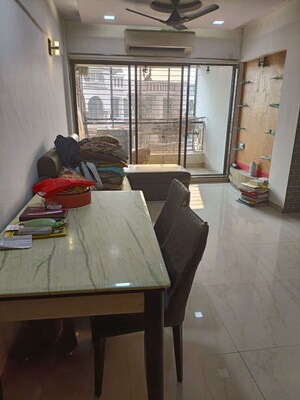 Living Room in 2 BHK Apartment at Concrete Sai Swar, Kharghar – for Rent