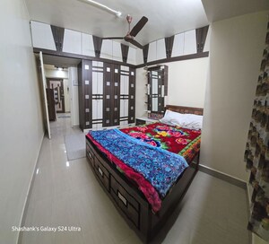 Bedroom in 1 BHK Apartment at Ajmera Housing Society, Pimpri – for Rent