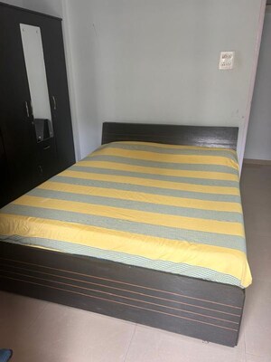 Bedroom in 2 BHK Apartment at Laxmi Nagar Society, Dhanori – for Rent