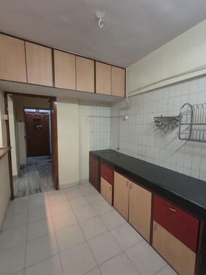 Kitchen in 2 BHK Apartment at Lok Upvan Apartment Phase 2, Vasant Vihar – for Rent