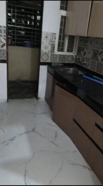 Kitchen in 2 BHK Apartment at Solitaire Co Op Housing Society Ltd, Dhanori – for Rent
