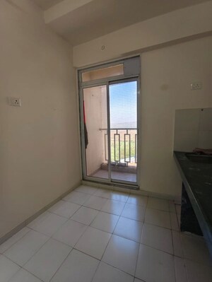 Kitchen in 1 BHK Apartment at Puraniks City Reserva, Ghodbunder Road – for Rent