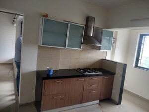 Kitchen in 2 BHK Apartment at Natraj Vela Enclave, Dhanori – for Rent