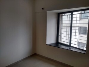 Room in 2 BHK Apartment at Natraj Vela Enclave, Dhanori – for Rent