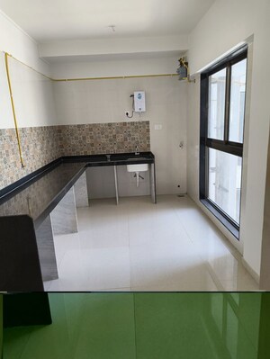 Kitchen in 4 BHK Apartment at Rajesh Raj Infinia, Malad West – for Rent