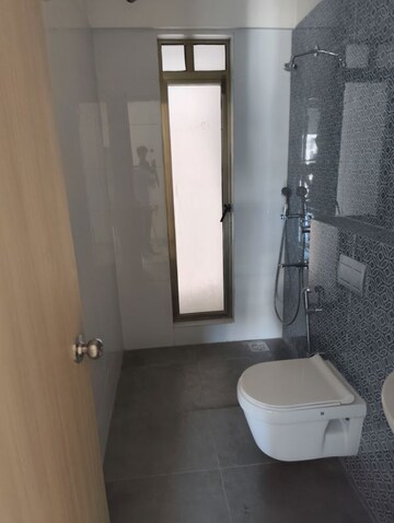 Bathroom in 4 BHK Apartment at Rajesh Raj Infinia, Malad West – for Rent