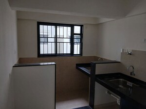 Kitchen in 2 BHK Apartment at Kohinoor Viva City, Dhanori – for Rent