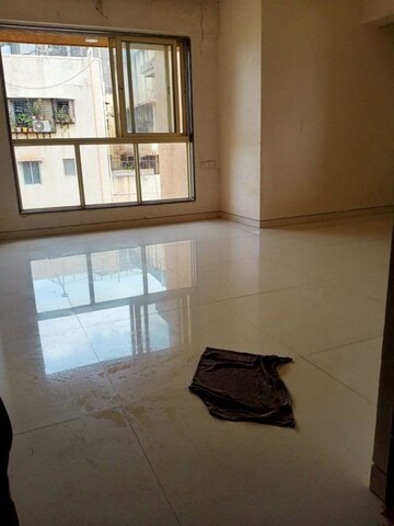 Room in 2 BHK Apartment at Pragati Kavya Residency, Vile Parle East – for Rent