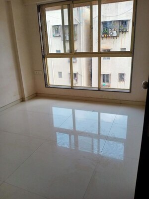 Room in 2 BHK Apartment at Pragati Kavya Residency, Vile Parle East – for Rent