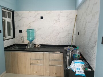 Kitchen in 2 BHK Apartment at Krishna Amorapolis, Dhanori – for Rent