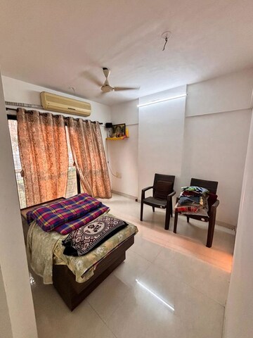 Living Room in 2 BHK Apartment at MPR Mahavir Darshan, Dahisar East – for Sale