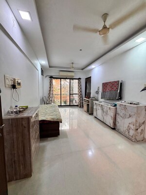 Living Room in 2 BHK Apartment at MPR Mahavir Darshan, Dahisar East – for Sale