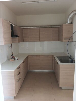 Kitchen in 2 BHK Apartment at Bhartiya City Nikoo Homes II, Thanisandra Main Road – for Rent