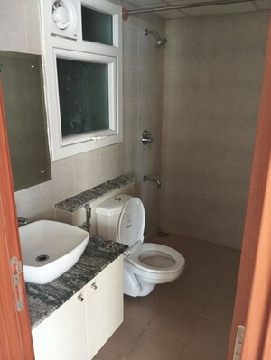 Bathroom in 2 BHK Apartment at Bhartiya City Nikoo Homes II, Thanisandra Main Road – for Rent