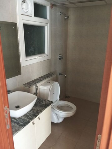 Bathroom in 2 BHK Apartment at Bhartiya City Nikoo Homes II, Thanisandra Main Road – for Rent