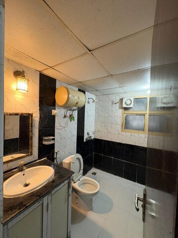 Bathroom in 2 BHK Apartment at Nimbus The Hyde park, Sector 78 – for Rent