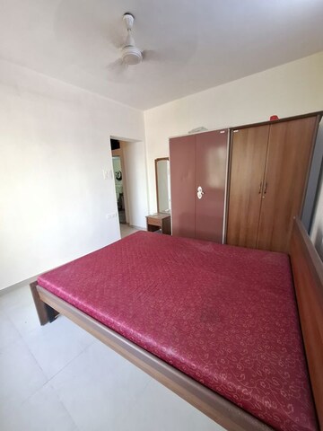 Bedroom in 2 BHK Apartment at New Heritage CHS, Dahisar West – for Rent