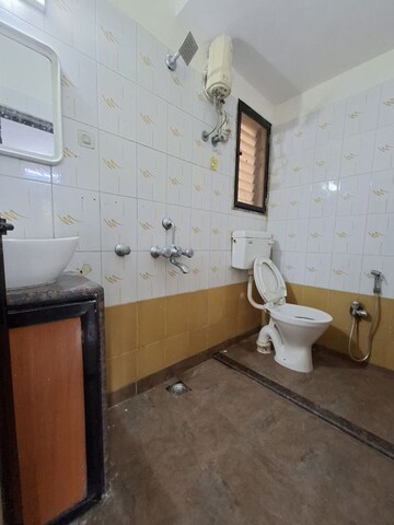 Bathroom in 2 BHK Apartment at New Heritage CHS, Dahisar West – for Rent