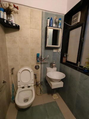 Bathroom in 2 BHK Apartment at Swapnalok Towers, Malad East – for Rent