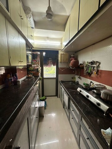 Kitchen in 2 BHK Apartment at KT Trigun Chs Ltd, Borivali West – for Sale