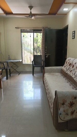 Living Room in 1 BHK Apartment at Dharma Nagar CHS, Borivali West – for Sale