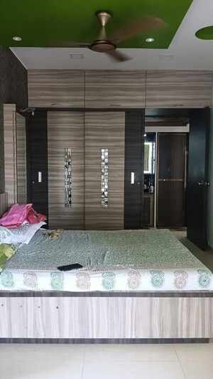 Bedroom in 1 BHK Apartment at Dharma Nagar CHS, Borivali West – for Sale