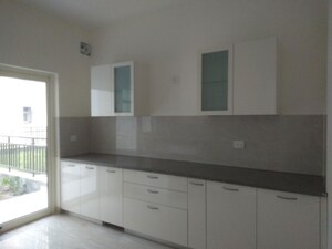 Kitchen in 3 BHK Builder Floor at Puri Aman Vilas, Sector 89 – for Sale
