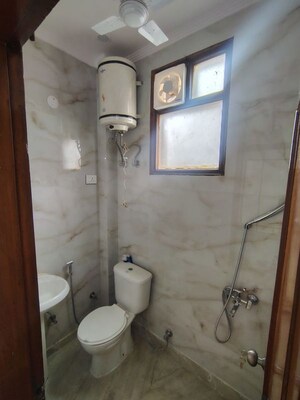 Bathroom in 2 BHK Builder Floor at Kalkaji – for Rent