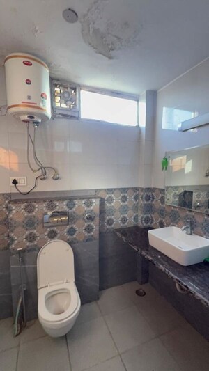 Bathroom in 2 BHK Builder Floor at Kalkaji – for Rent