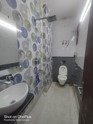 Bathroom in 3 BHK Builder Floor at Dwarka Mor – for Rent