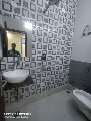 Bathroom in 3 BHK Builder Floor at Dwarka Mor – for Rent
