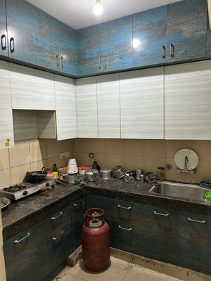 Kitchen in 2 BHK Apartment at Panchsheel Greens, Sector 16 Greater Noida – for Rent