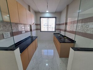 Kitchen in 1.5 BHK Apartment at Paradise Park, Katrap – for Sale
