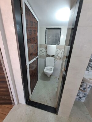 Bathroom in 1.5 BHK Apartment at Paradise Park, Katrap – for Sale