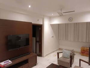 Living Room in 2 BHK Apartment at Juhu Gulmohar CHS, Vile Parle West – for Rent