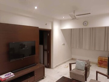 Living Room in 2 BHK Apartment at Juhu Gulmohar CHS, Vile Parle West – for Rent
