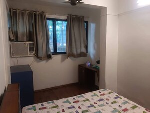 Living Room in 2 BHK Apartment at Juhu Gulmohar CHS, Vile Parle West – for Rent