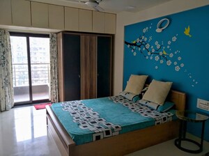 Bedroom in 2 BHK Apartment at NRI Complex Phase 2, Seawoods – for Rent