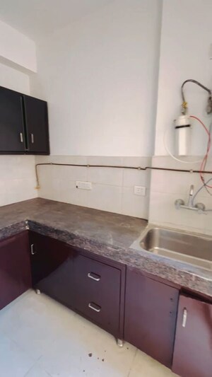 Kitchen in 2 BHK Apartment at Ajnara Le Garden, Sector 16b Greater Noida – for Sale