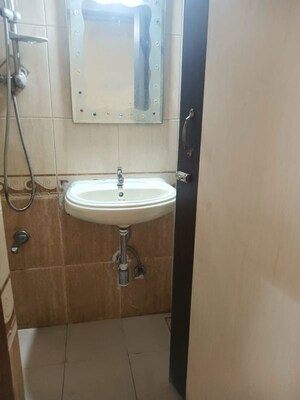 Bathroom in 2 BHK Apartment at Kanjurmarg West – for Rent
