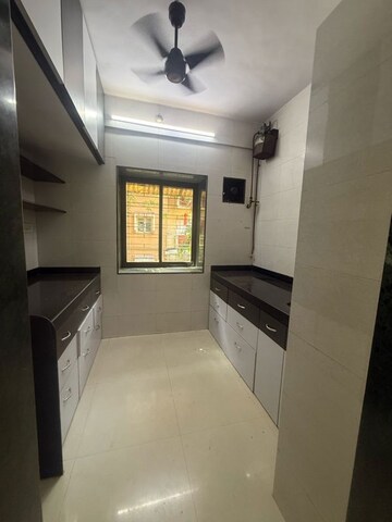 Kitchen in 1 BHK Apartment at Yashodhara CHS, Goregaon East – for Rent