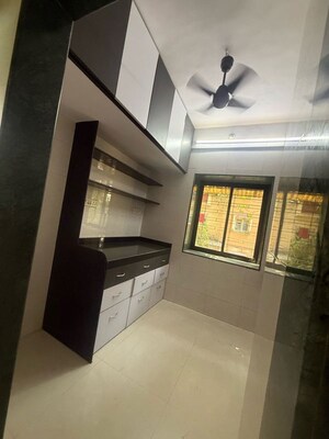 Kitchen in 1 BHK Apartment at Yashodhara CHS, Goregaon East – for Rent
