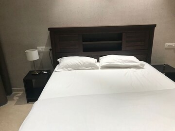 Bedroom in 2 BHK Apartment at Castle Rock, Powai – for Rent