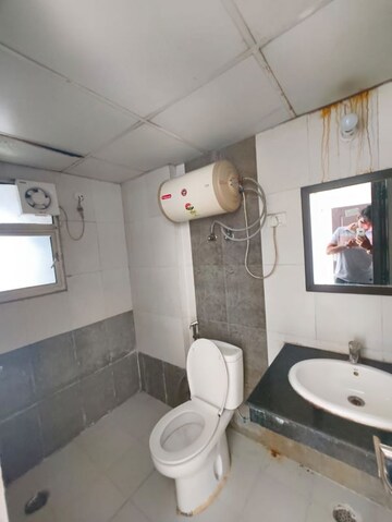 Bathroom in 3 BHK Apartment at Gaur Sportswood, Sector 79 – for Rent