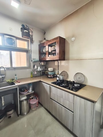 Kitchen in 2 BHK Apartment at Hiranandani Woodville, Ghodbunder Road – for Rent